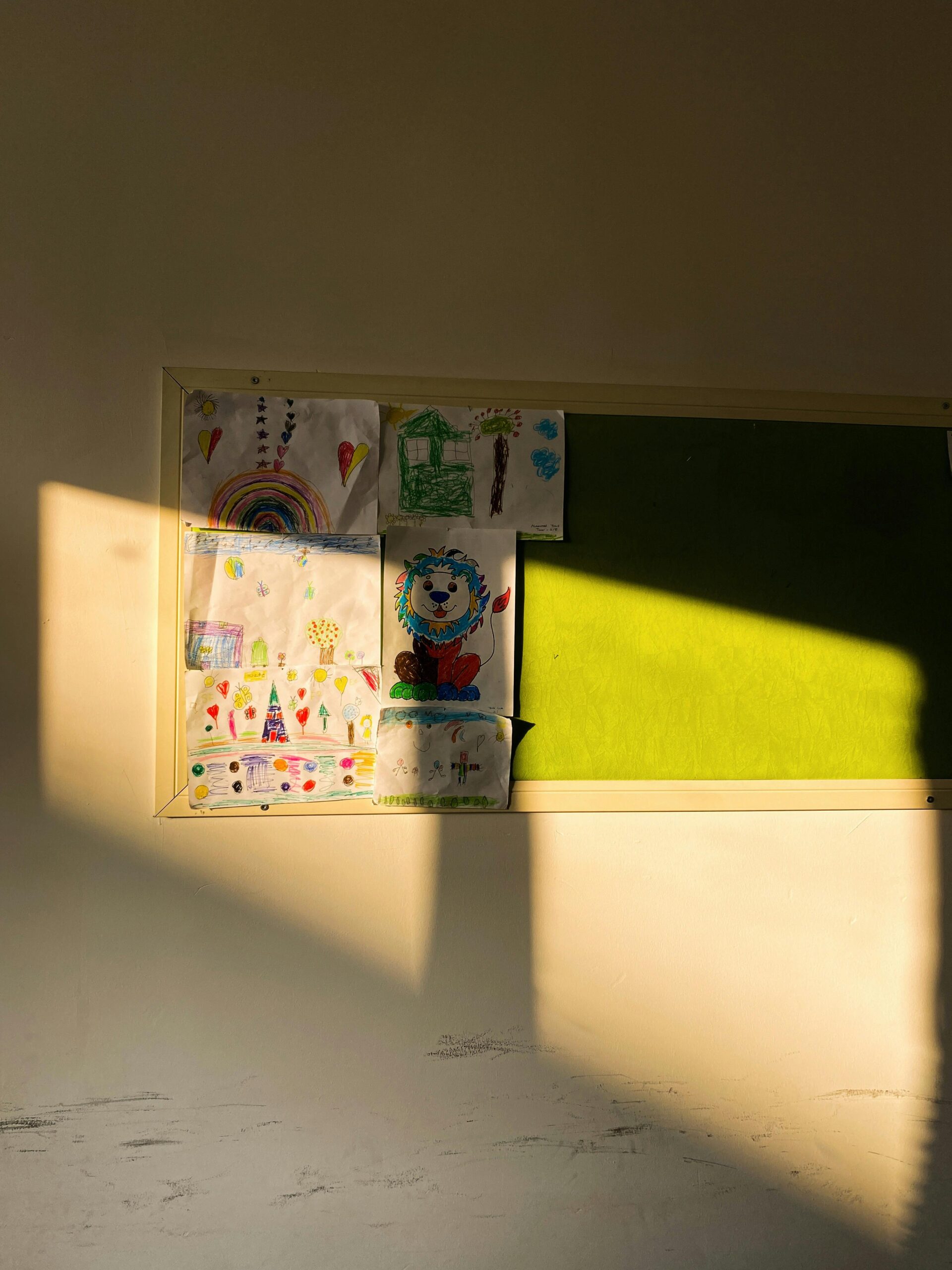 picture of a notice board in a school. The image symbolises the memoirs writing exercise about rules that were in place in a system in your past